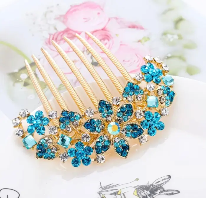 Rhinestone embellished floral hair comb gold and blue accents