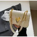 Elegant creamy rose kiss-lock clutch bag