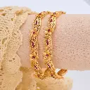 Floral Ruby-Accented Bangles