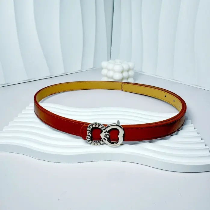 Skinney belt with designer buckle